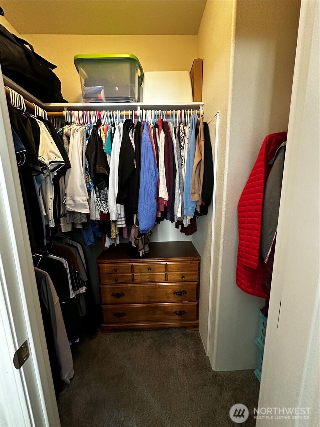 1720 Maple Lane, Unit 33 Kent, WA 98030 - Photo 8 of 20 a view of walk in closet with clothes