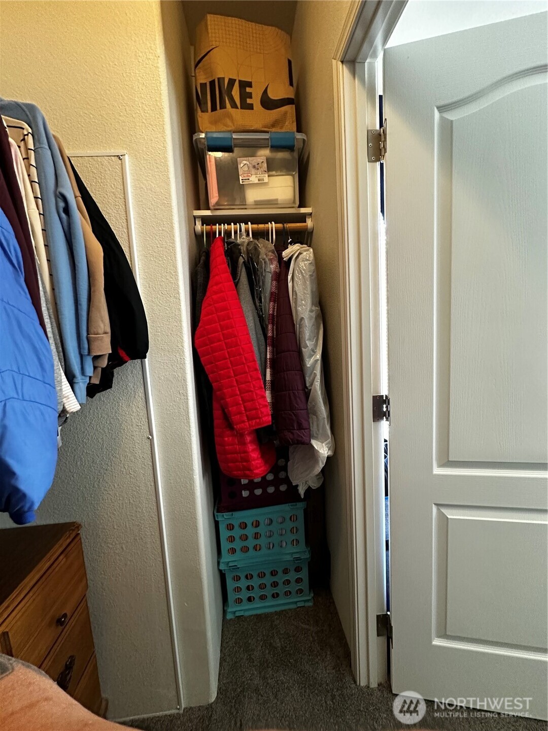 1720 Maple Lane, Unit 33 Kent, WA 98030 - Photo 9 of 20 a view of walk in closet with clothes and shoes