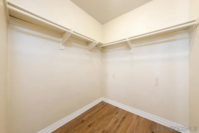 a view of a room with racks on the wall