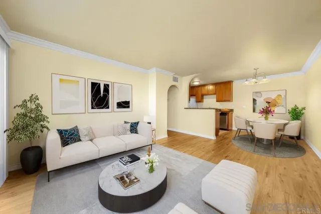 a living room with furniture and a table