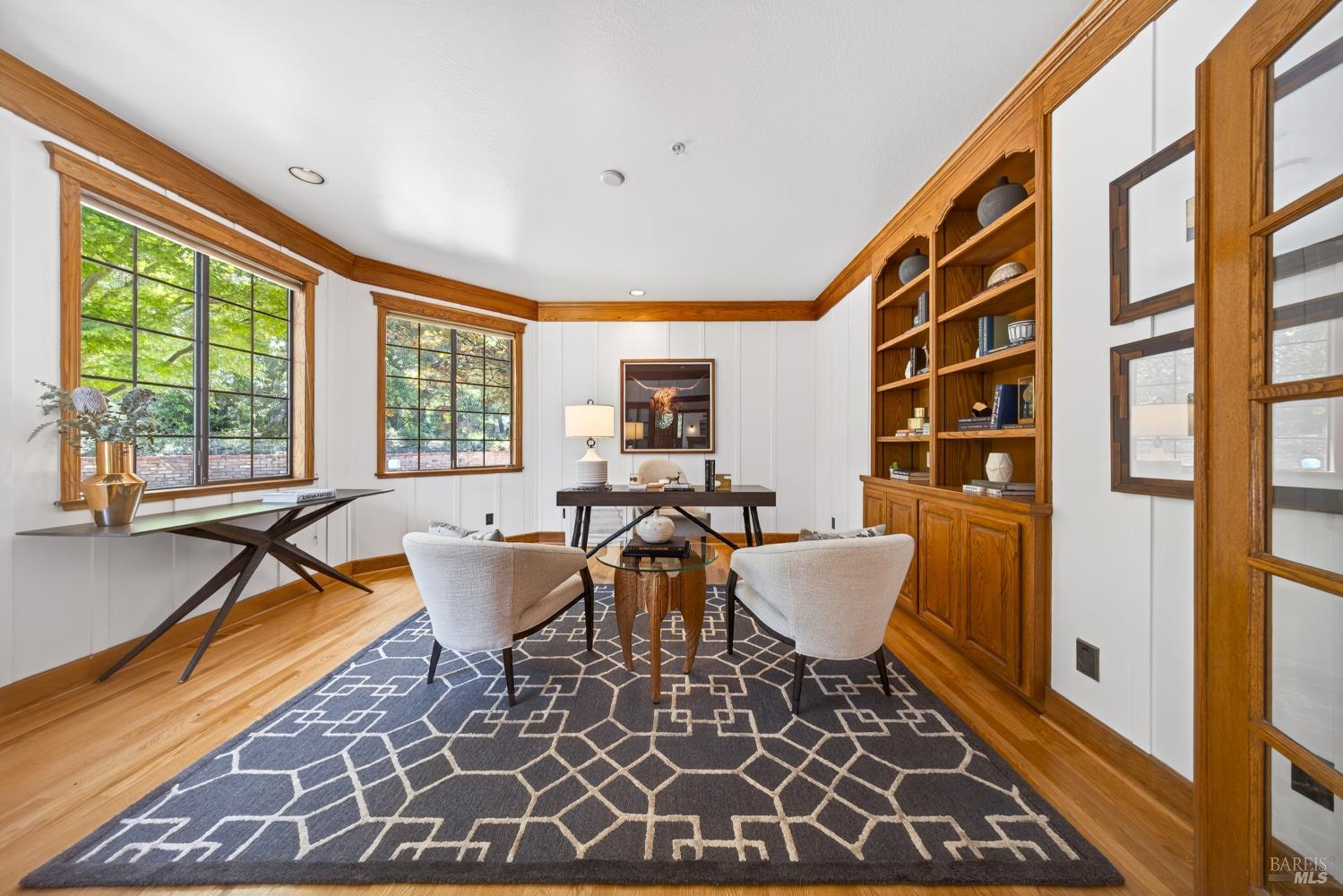 10 Lockton Lane Novato, CA 94945 - Photo 23 of 68 Main-level home office with large windows, tree views, and a quiet location facing Lockton Lane.
