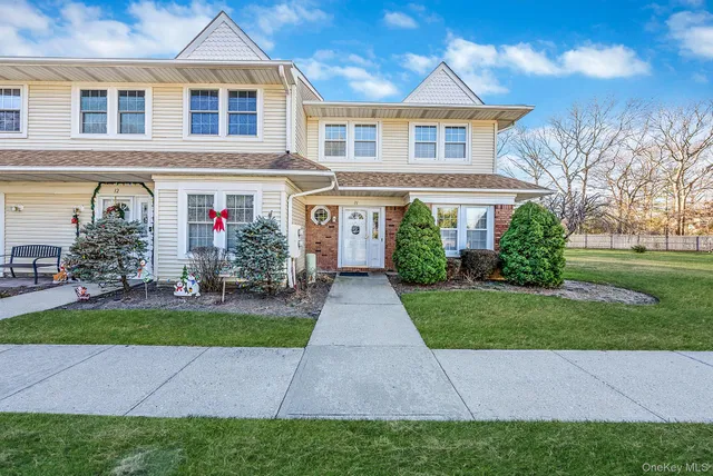 front view of house with a yard