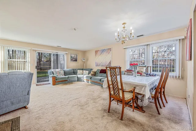 a view of a livingroom and dining room