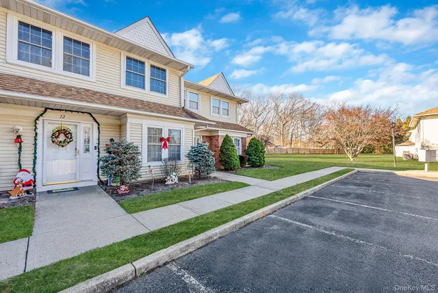 a front view of house with yard