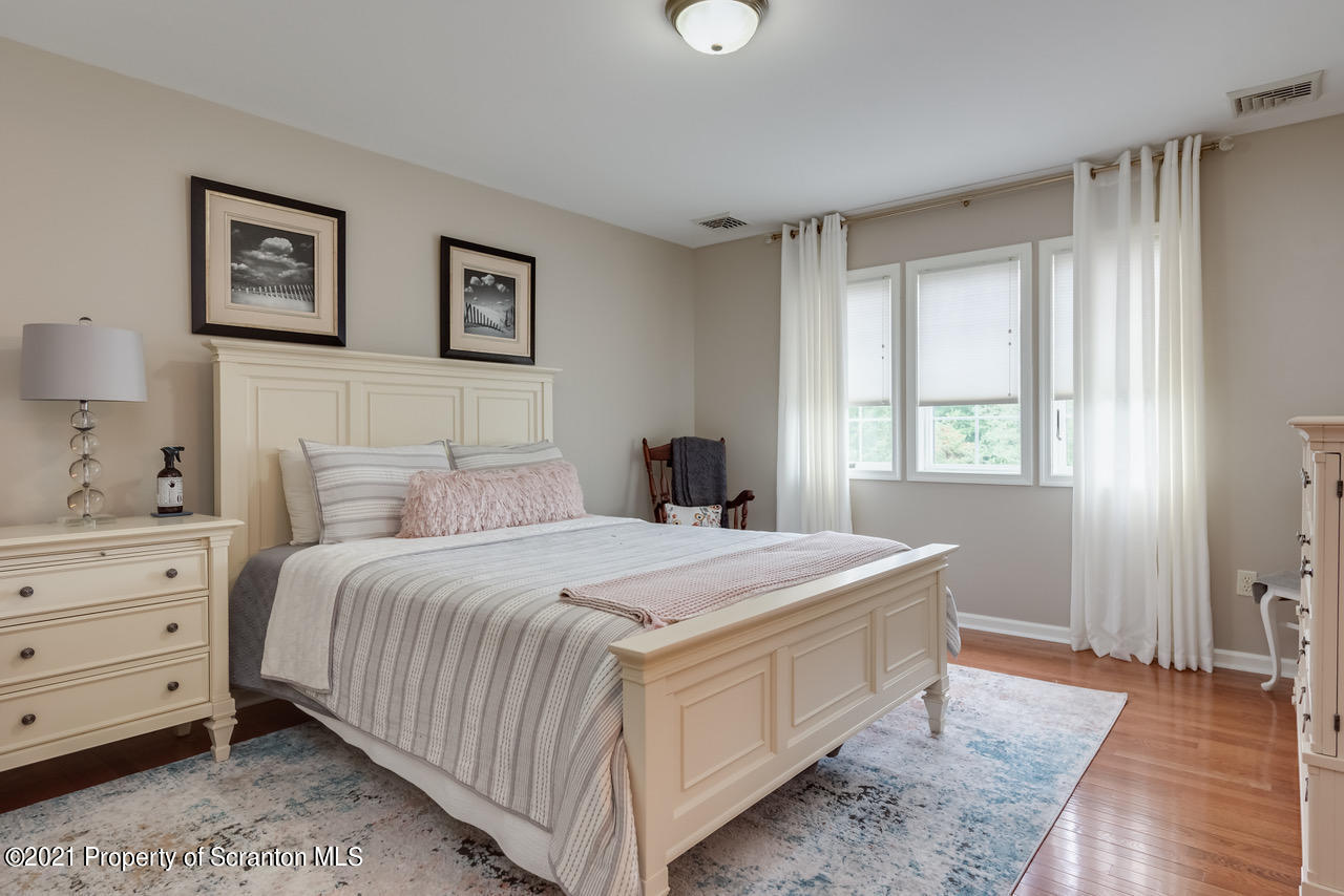 14 Kipling Drive Moosic, PA 18507 - Photo 24 of 42 a bedroom with a bed and a window