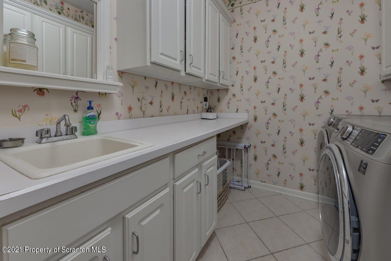 14 Kipling Drive Moosic, PA 18507 - Photo 27 of 42 a kitchen with a sink cabinets and appliances