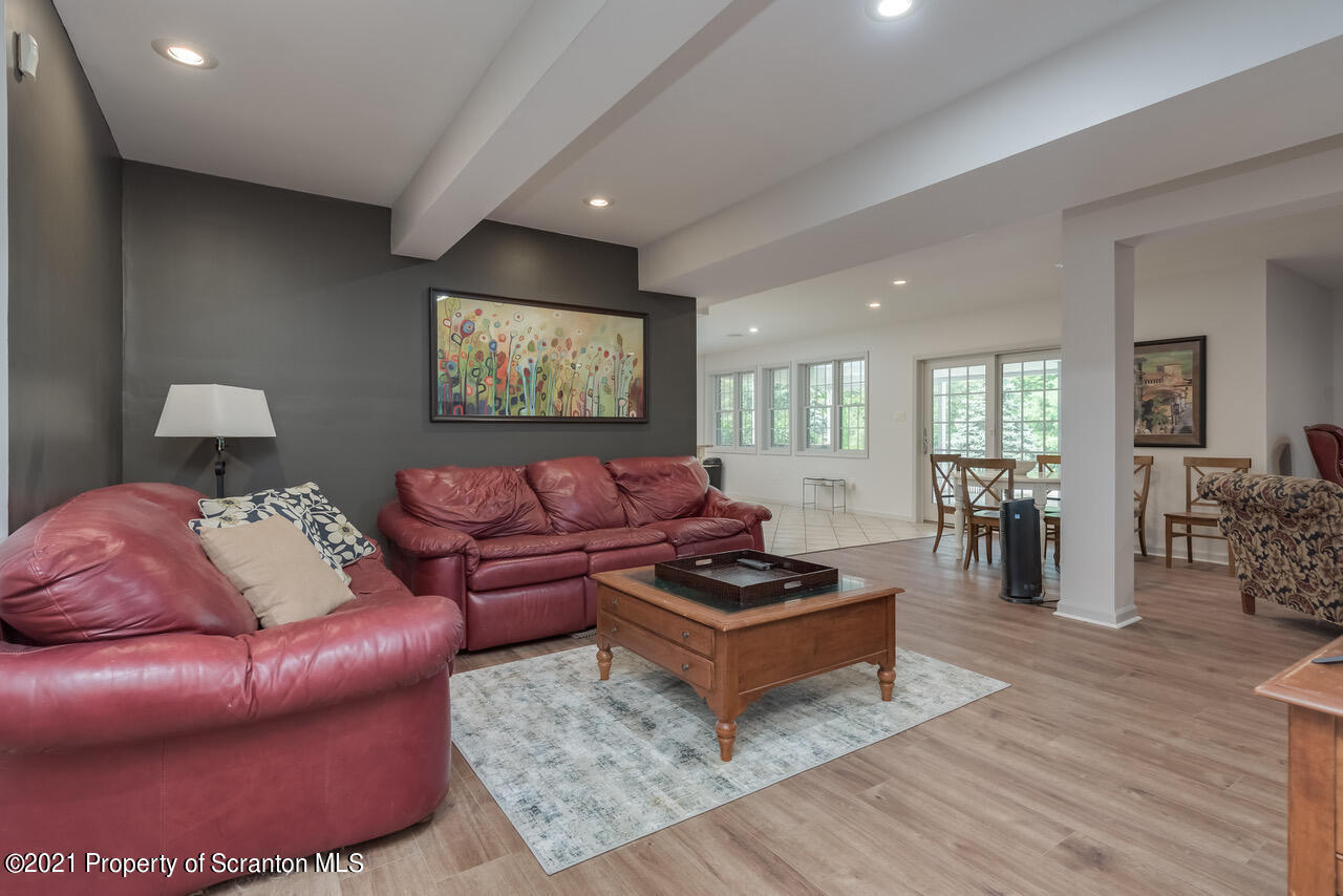 14 Kipling Drive Moosic, PA 18507 - Photo 29 of 42 a living room with furniture a wooden floor and a large window