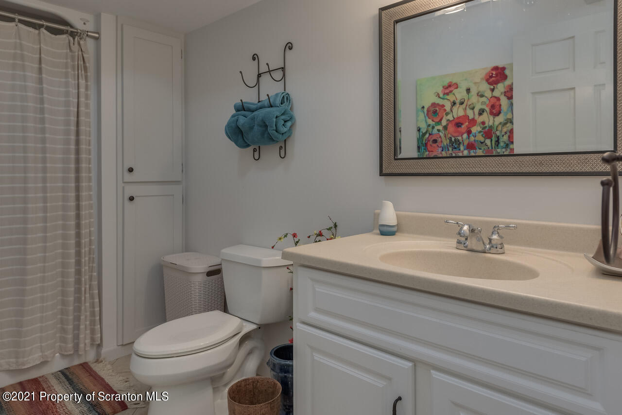 14 Kipling Drive Moosic, PA 18507 - Photo 31 of 42 a bathroom with a toilet and a sink