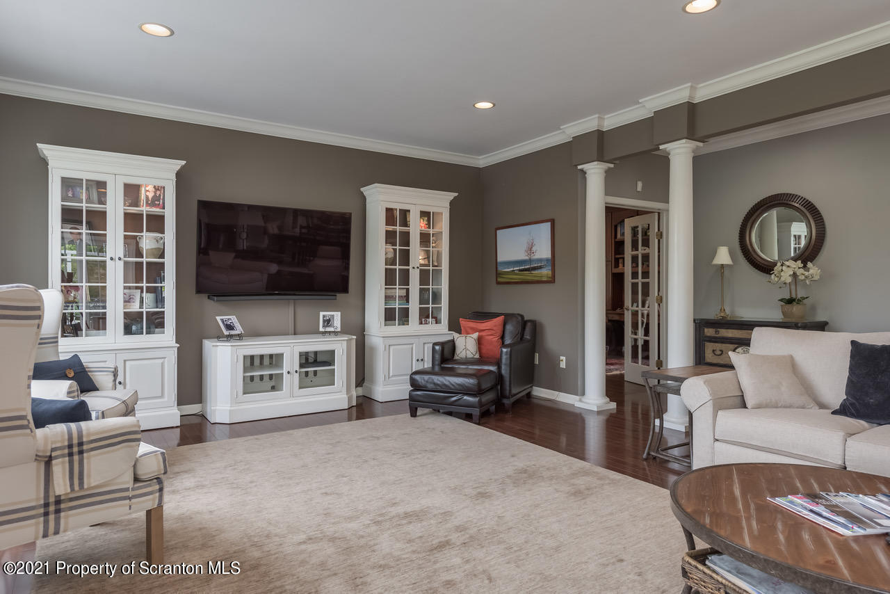 14 Kipling Drive Moosic, PA 18507 - Photo 6 of 42 a living room with furniture and a flat screen tv