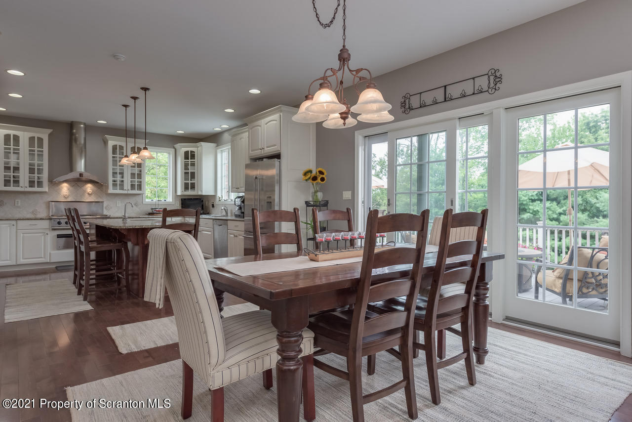 14 Kipling Drive Moosic, PA 18507 - Photo 10 of 42 a view of a dining room with furniture window and outside view