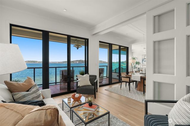a view of a livingroom with furniture and wooden floor