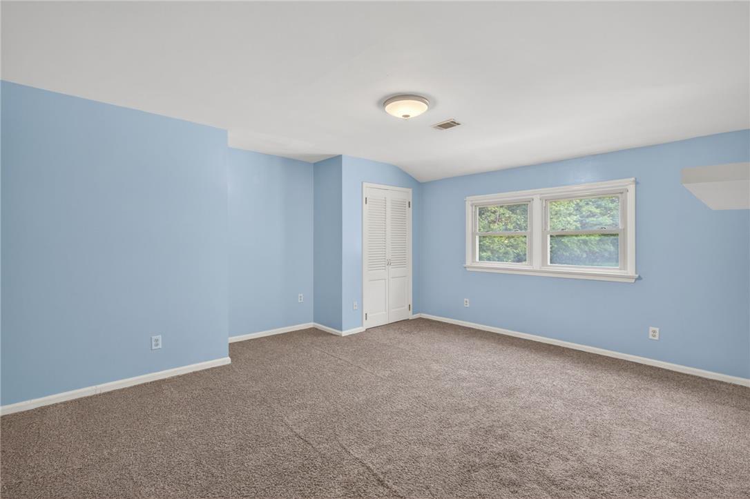 1371 Stoke Park Road Bethlehem, PA 18017 - Photo 40 of 55 a view of an empty room with a window