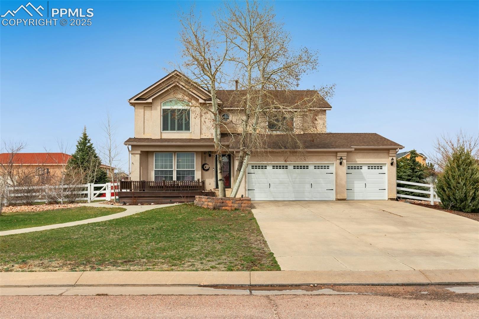 Traditional 2 story home with stucco siding