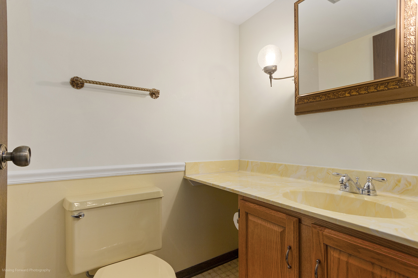 1570 West Goldengate Drive Addison, IL 60101 - Photo 17 of 34 a bathroom with a sink and a toilet