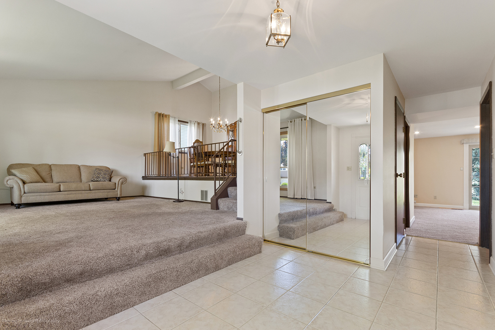1570 West Goldengate Drive Addison, IL 60101 - Photo 2 of 34 a spacious bedroom with a bed and a view of bathroom