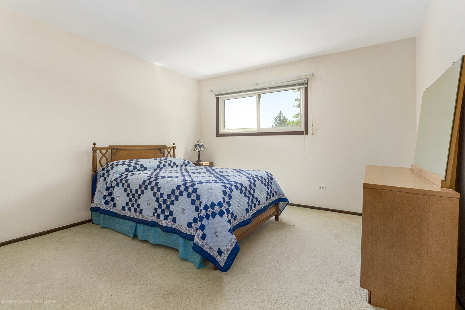 1570 West Goldengate Drive Addison, IL 60101 - Photo 22 of 34 a bedroom with a bed and wooden floor