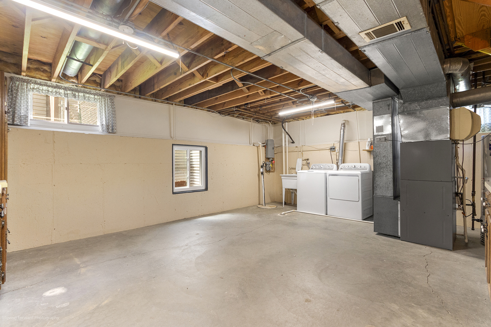 1570 West Goldengate Drive Addison, IL 60101 - Photo 27 of 34 a view of a kitchen with refrigerator and white walls