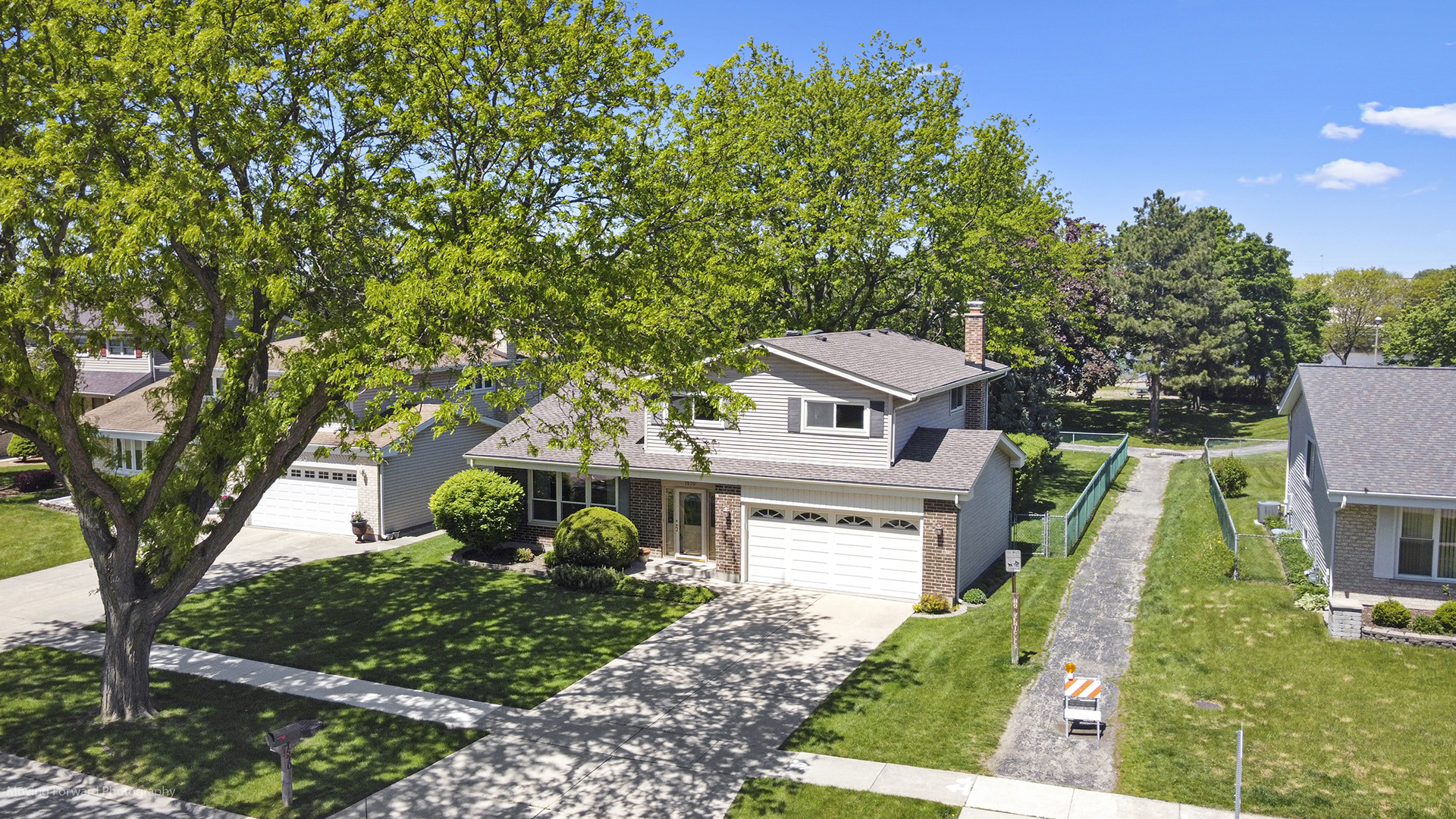 1570 West Goldengate Drive Addison, IL 60101 - Photo 29 of 34 a view of a house with a yard