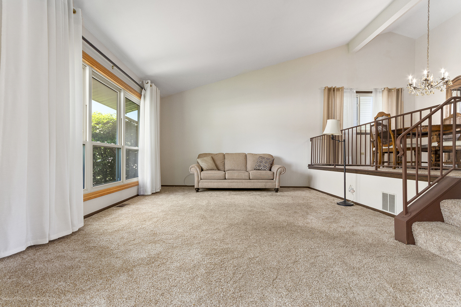 1570 West Goldengate Drive Addison, IL 60101 - Photo 3 of 34 a living room with furniture and a window