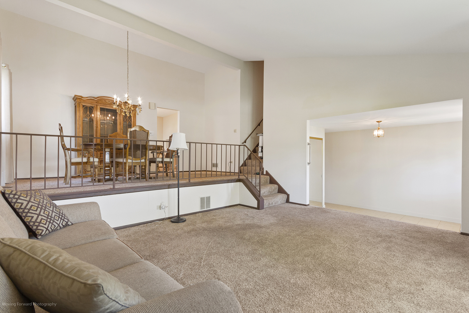 1570 West Goldengate Drive Addison, IL 60101 - Photo 4 of 34 a view of a livingroom with furniture and staircase