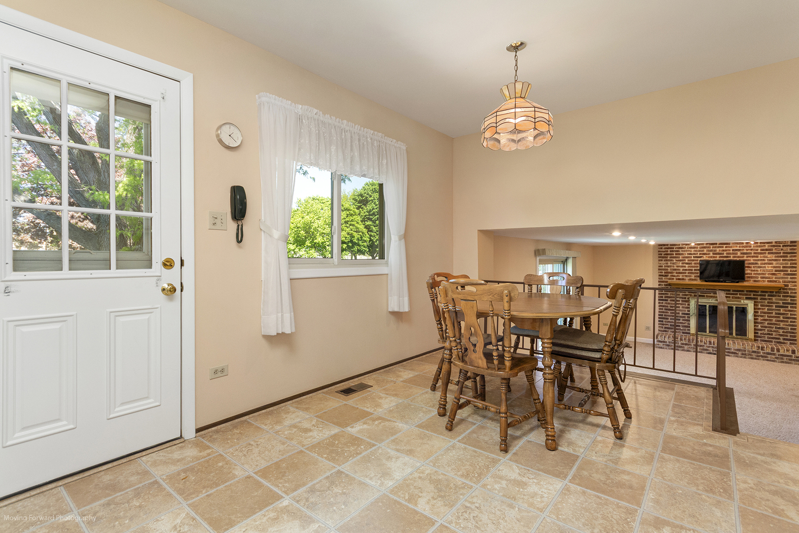 1570 West Goldengate Drive Addison, IL 60101 - Photo 9 of 34 a view of a dining room with furniture and a window