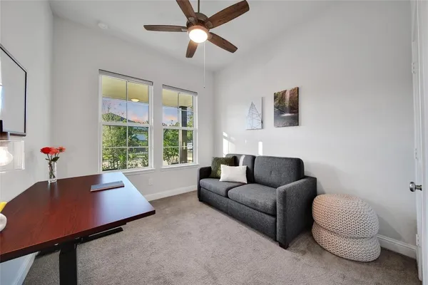 a bathroom with a toilet a sink and a mirror