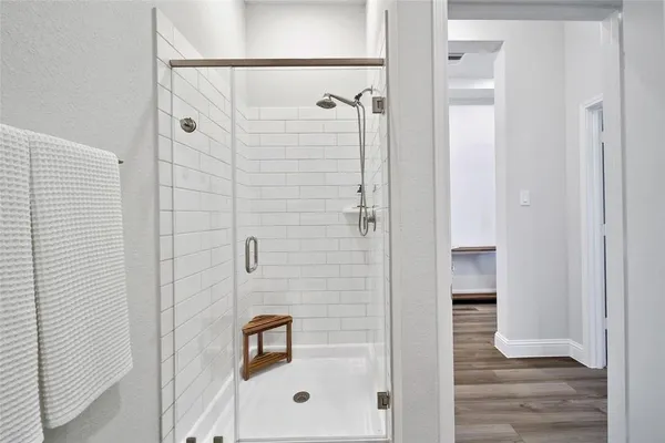 a bedroom with bed and window