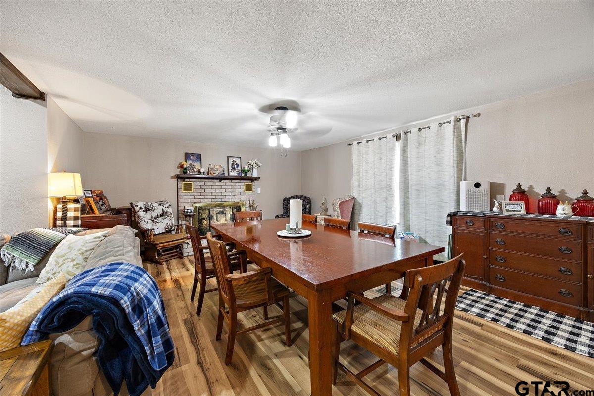 429 Main Street Rusk, TX 75785 - Photo 11 of 26 a view of a dining room with furniture and a chandelier