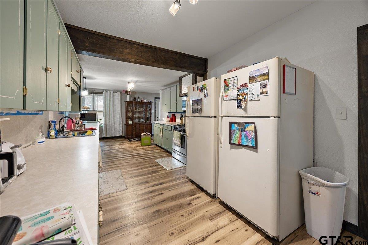 429 Main Street Rusk, TX 75785 - Photo 15 of 26 a white refrigerator freezer sitting inside of a kitchen