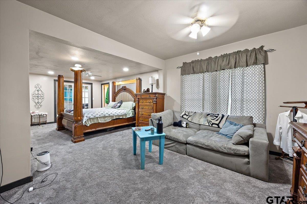 429 Main Street Rusk, TX 75785 - Photo 16 of 26 a living room with furniture and a chandelier