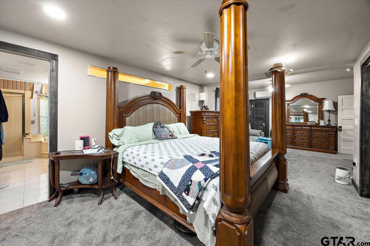 429 Main Street Rusk, TX 75785 - Photo 17 of 26 a bedroom with a bed chair and window