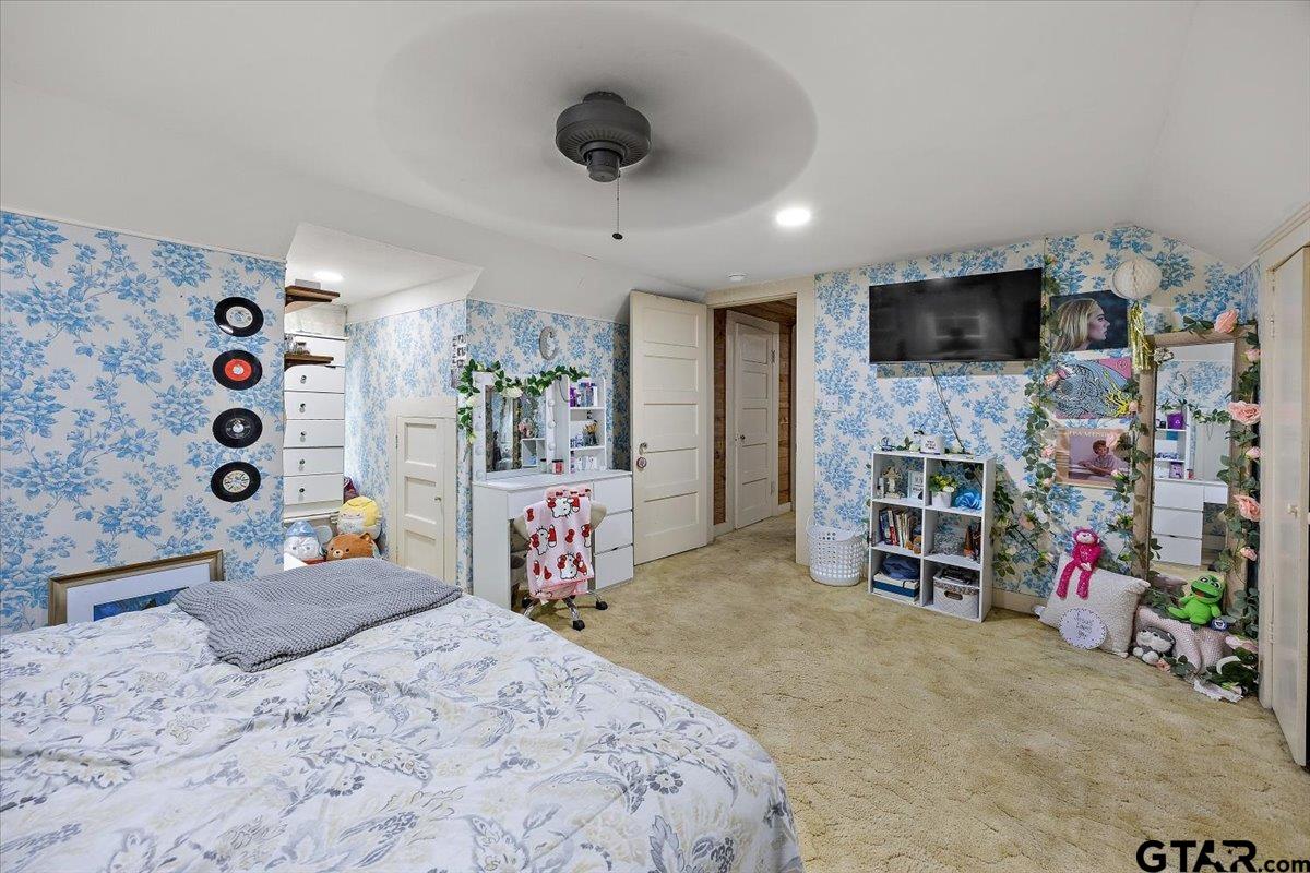 429 Main Street Rusk, TX 75785 - Photo 21 of 26 a bedroom with furniture and a flat screen tv