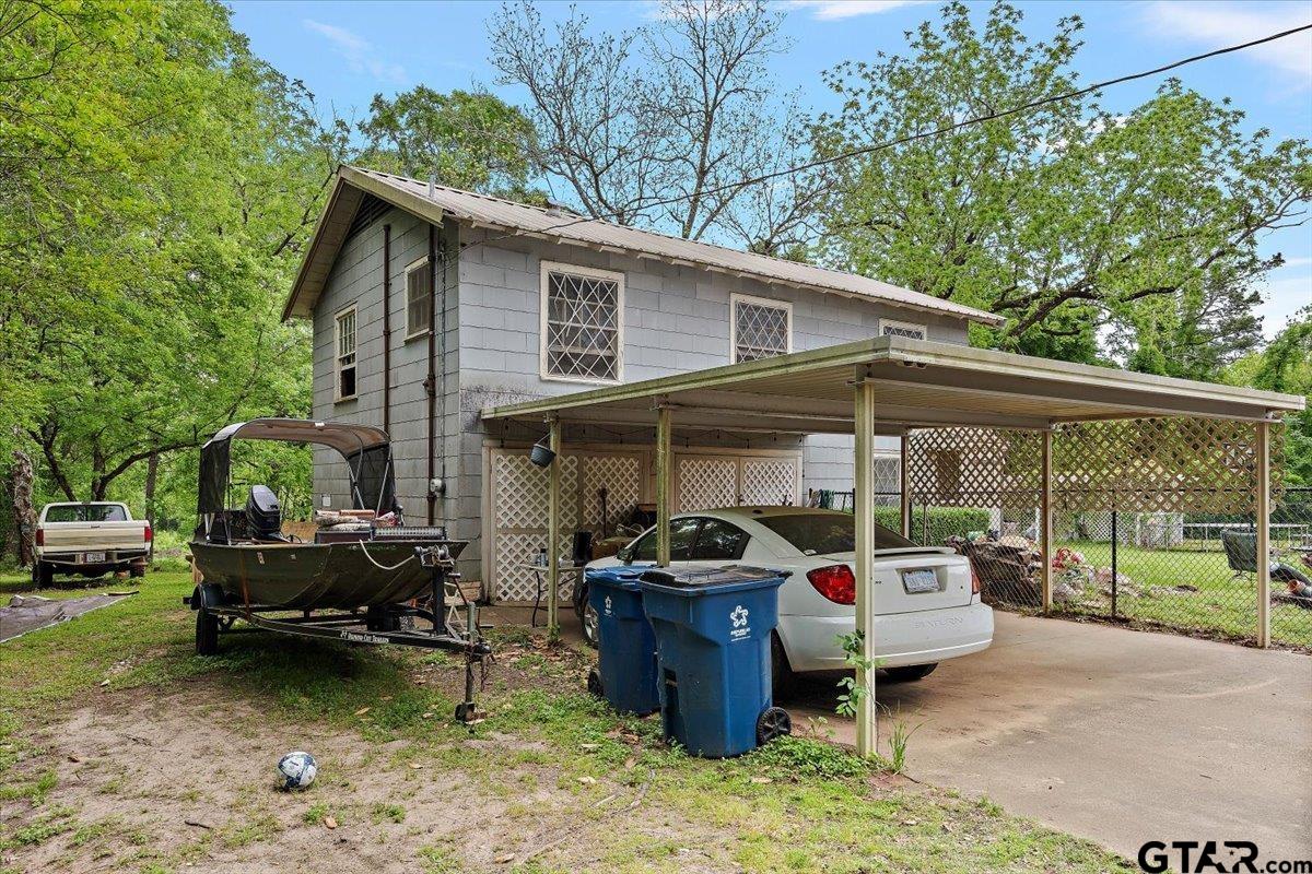 429 Main Street Rusk, TX 75785 - Photo 8 of 26 a view of a patio with a table and chairs in a patio