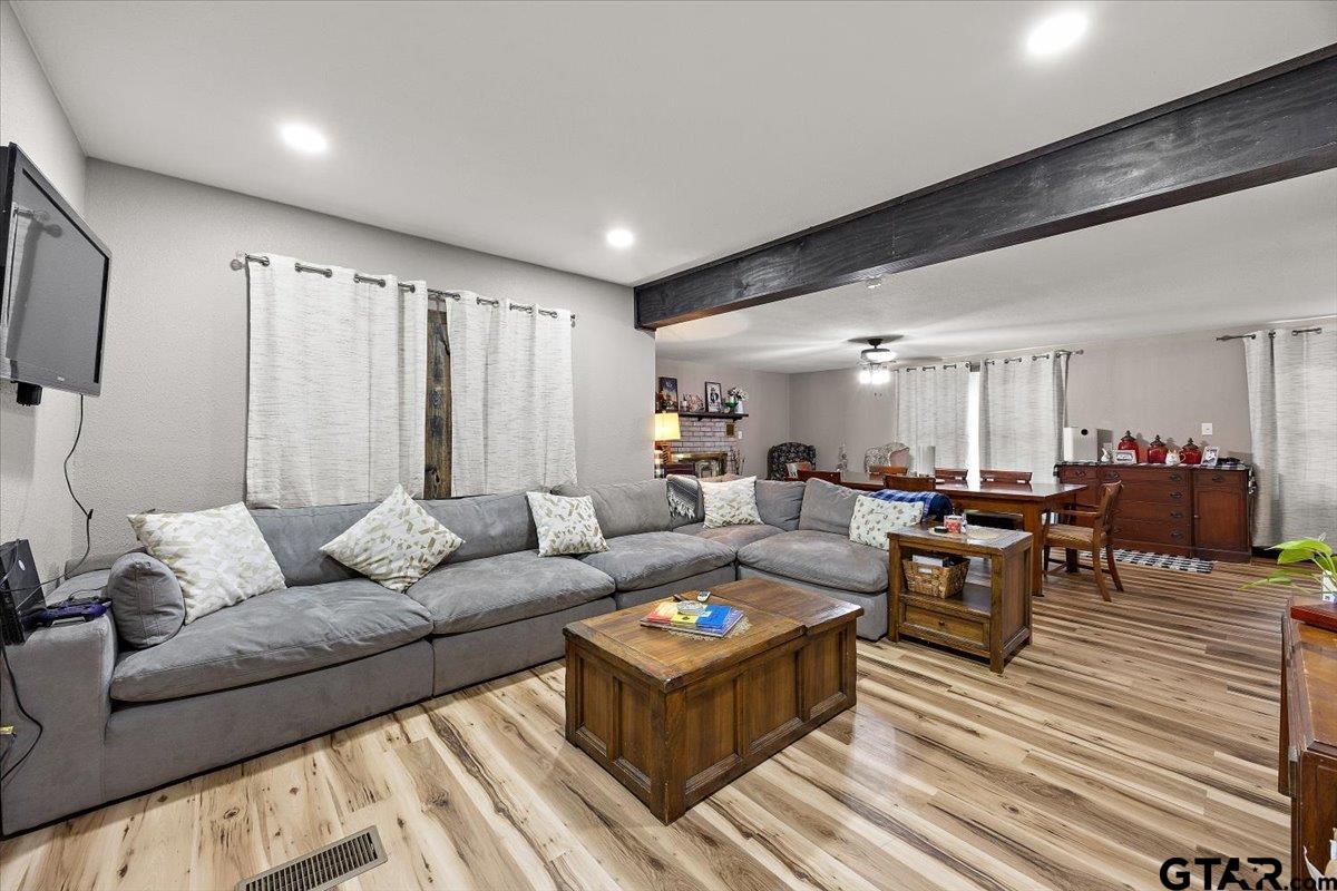 429 Main Street Rusk, TX 75785 - Photo 9 of 26 a living room with furniture and a wooden floor