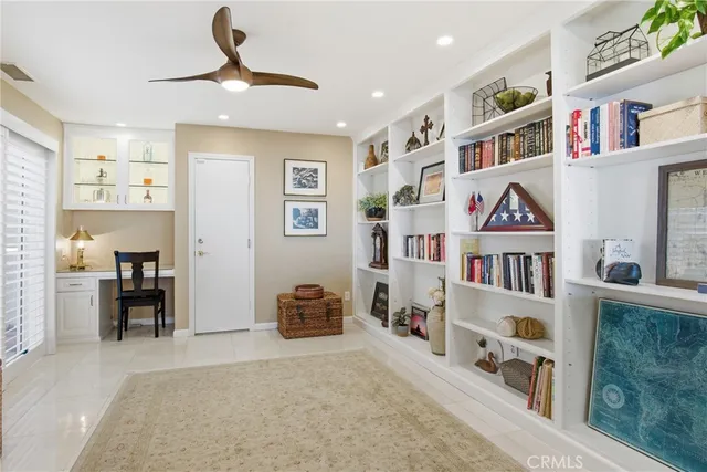 a view of a workspace with furniture and toys