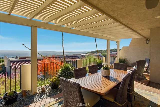 a view of an outdoor space with furniture