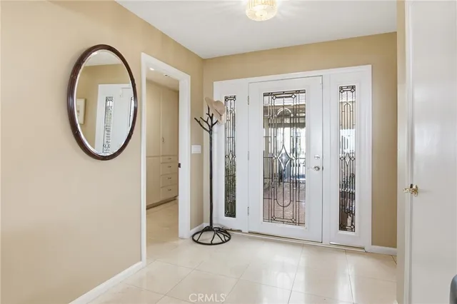 a view of a room with sliding door and a window