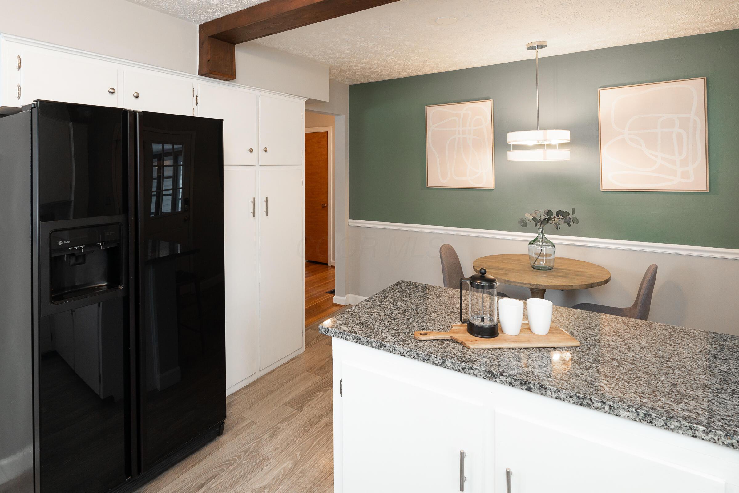 4422 Zeller Road Columbus, OH 43214 - Photo 16 of 45 Enjoy bar seating and space for your dining table