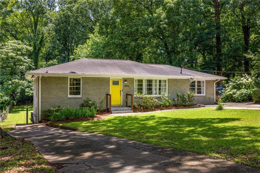 2041 Trailwood Road Decatur, GA 30032 - Photo 1 of 1 a front view of a house with a yard