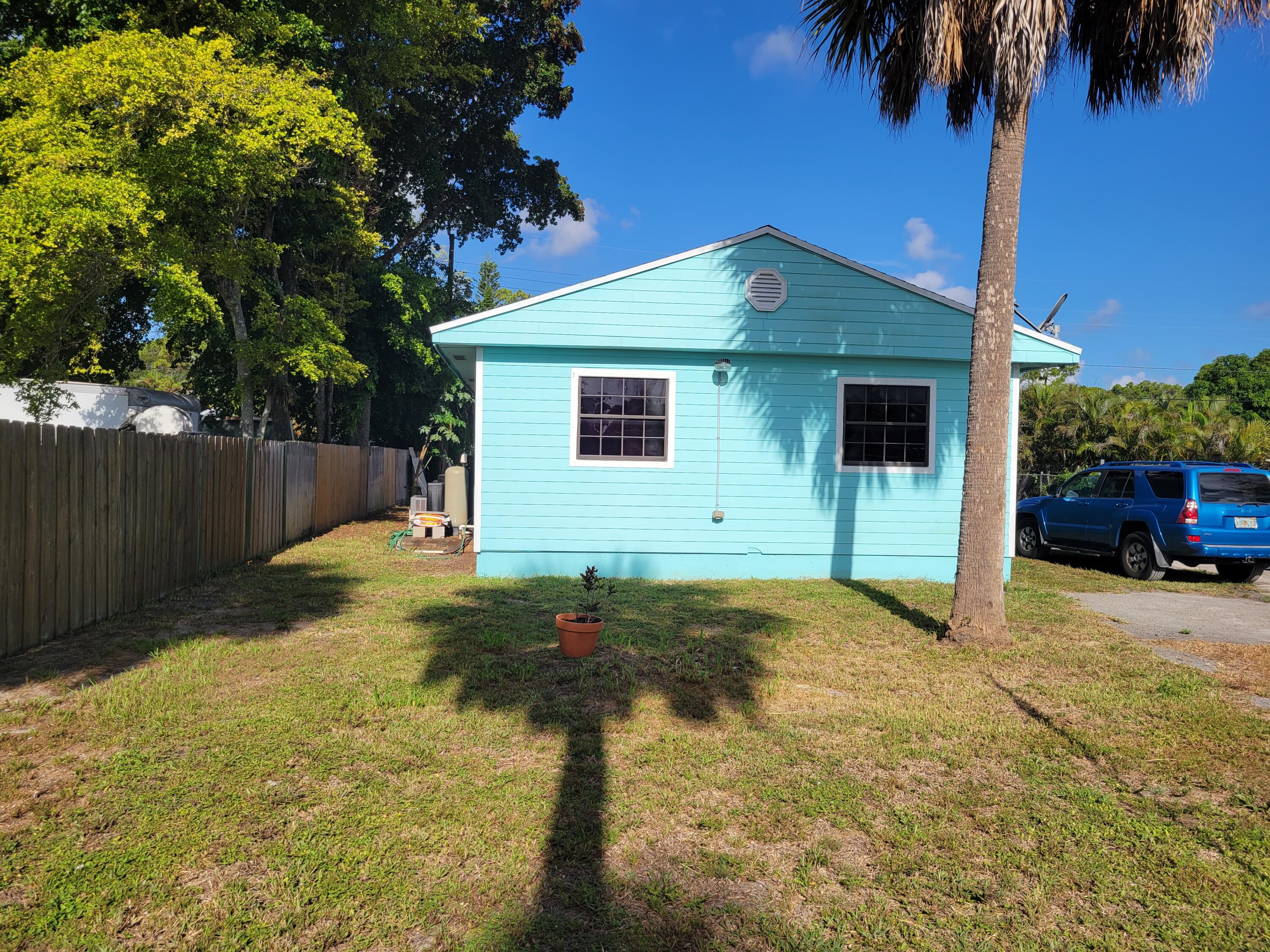 345 Tall Pines Road West Palm Beach, FL 33415 - Photo 1 of 22 20220827_092931