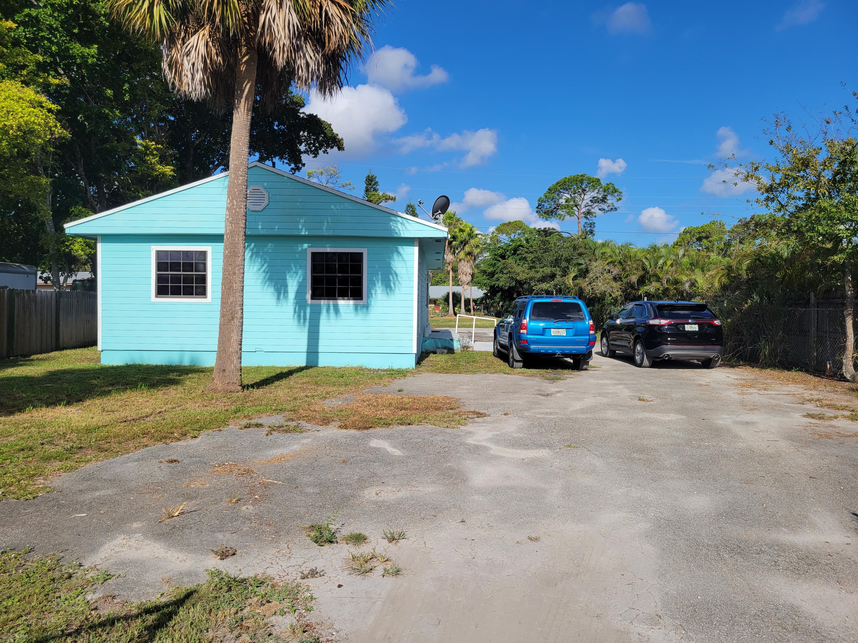 345 Tall Pines Road West Palm Beach, FL 33415 - Photo 2 of 22 20220827_092956
