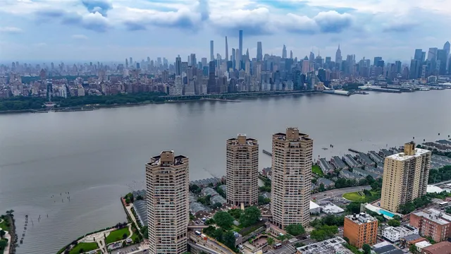a view of a city with tall buildings