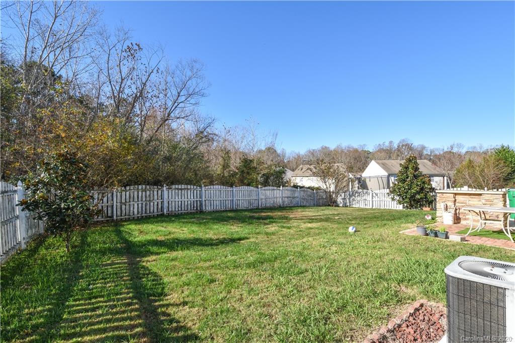 8716 Chalkstone Road Charlotte, NC 28216 - Photo 27 of 31 a view of a back yard