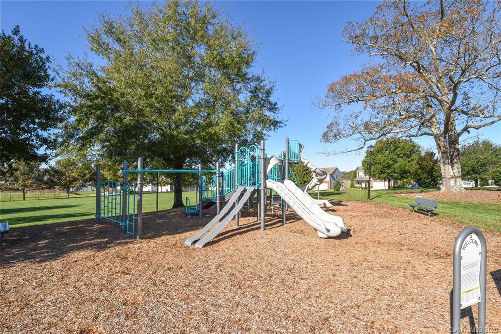 8716 Chalkstone Road Charlotte, NC 28216 - Photo 31 of 31 a view of a park with slide