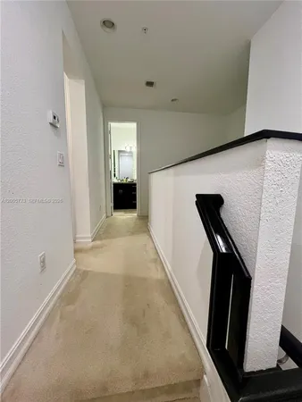 a en suite bathroom with a sink and mirror