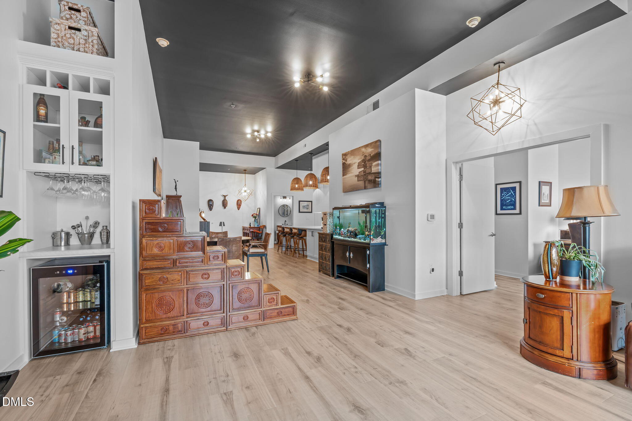 319 Fayetteville Street, Unit 410 Raleigh, NC 27601 - Photo 12 of 28 a living room with furniture and a wooden floor