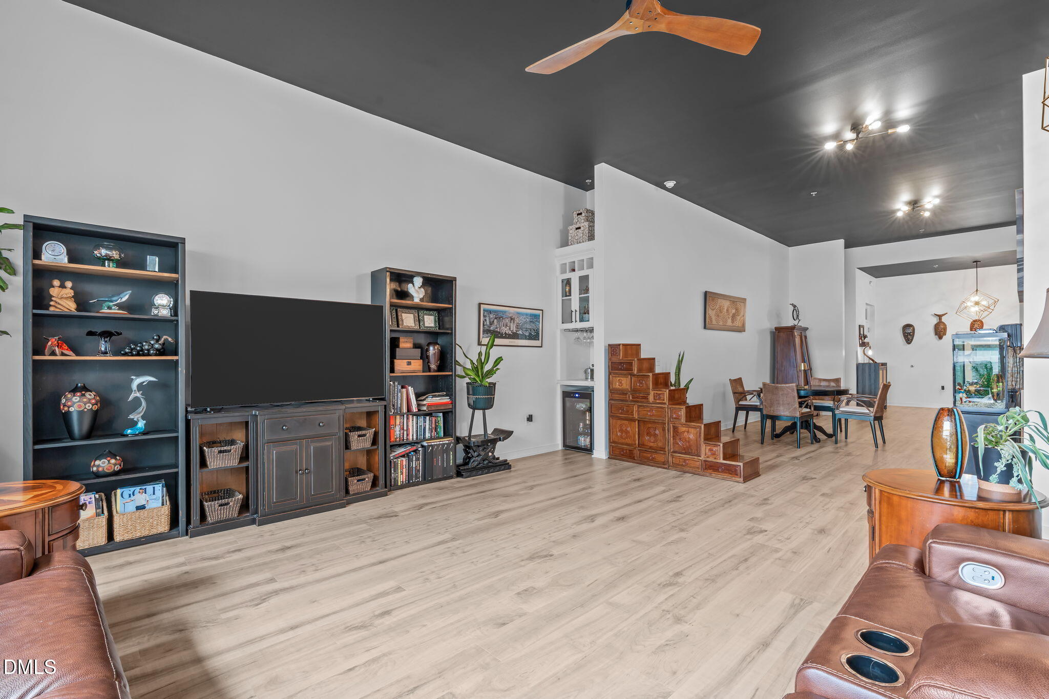 319 Fayetteville Street, Unit 410 Raleigh, NC 27601 - Photo 14 of 28 a living room with furniture and a flat screen tv