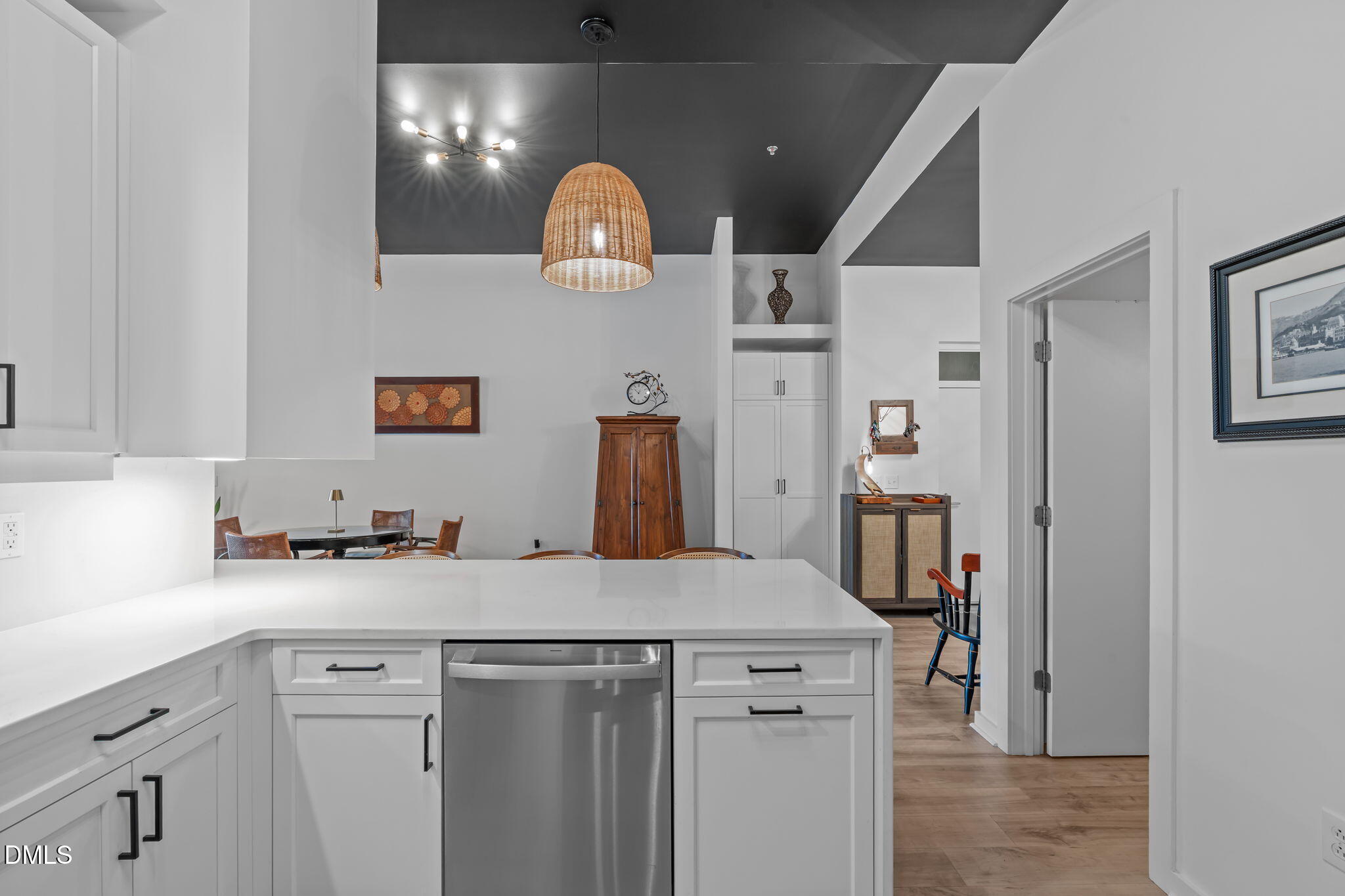 319 Fayetteville Street, Unit 410 Raleigh, NC 27601 - Photo 7 of 28 a kitchen with a sink a stove and refrigerator