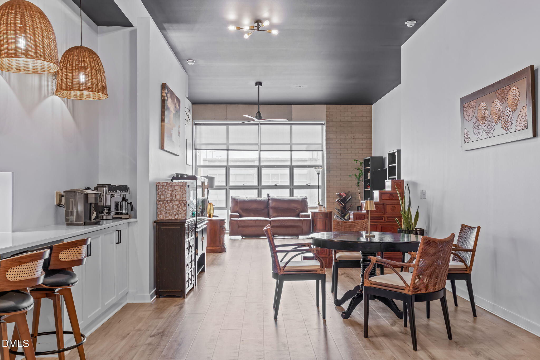 319 Fayetteville Street, Unit 410 Raleigh, NC 27601 - Photo 10 of 28 a view of a dining room with furniture window and outside view