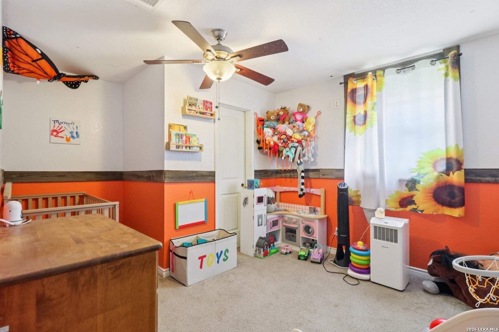 215-213 Coughran Road Pleasanton, TX 78064 - Photo 8 of 13 a children room with toys and a fan